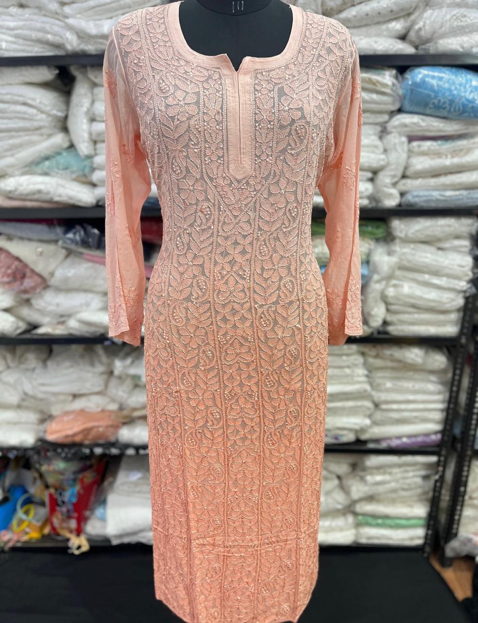 Elegant Lucknowi Chikankari Viscose Kurti in a delicate peach/salmon-pink